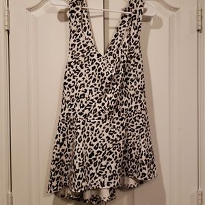 Leopard print peplum top with crisscross back